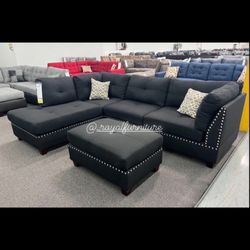 Black Reversible Sectional With Ottoman 