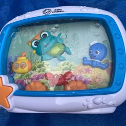 BABY EINSTEIN SEA DREAMS SOOTHER MUSICAL LIGHT UP CRIB TOY