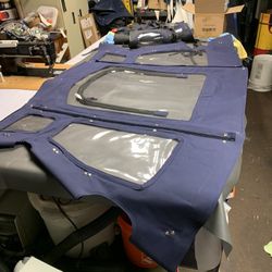 Marine Canvas, Bimini’s, Enclosures,  T-Tops, Sailboats, Awnings Eisenglass, T-Tops , Sunbrella, Boat Covers, Custom Fit ,  Made To Order 