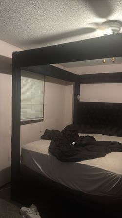 Velvet tufted canopy bed