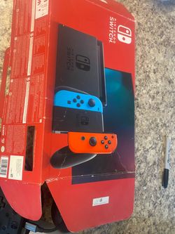 V1 Nintendo switch along with two pro controllers