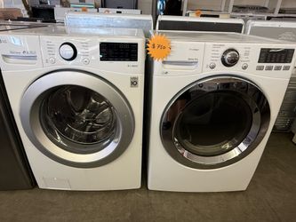 LG white front load washer and dryer