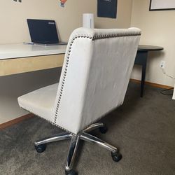 Creamy white very comfortable desk chair.