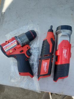 Milwaukee fuel hammer drill and rotary tool and flashlight