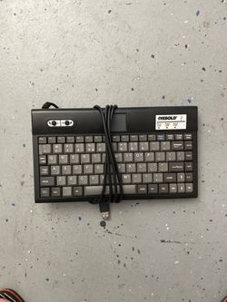 Keyboard with Integrated Mouse Touch Pad