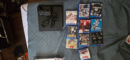 PS4 Console with Controller and 9 Games