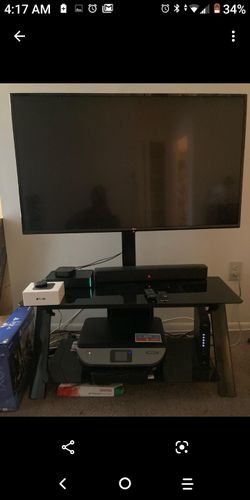 All Black TV Bracket With Rotating Mount and Wire Console