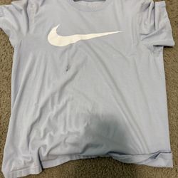 Nike Light Blue Tshirt With Nike Symbol In Middle 