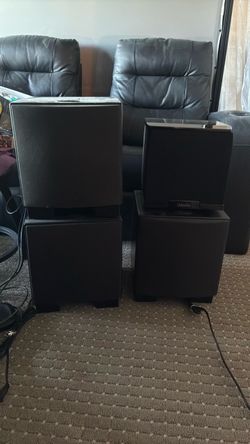 3 Martin Logan and 1 definitive subwoofer