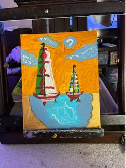 Sailboats coming back in