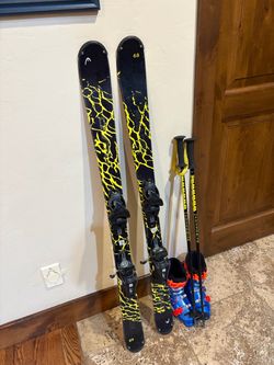 Downhill skis, boots, and poles for 7-9 year old
