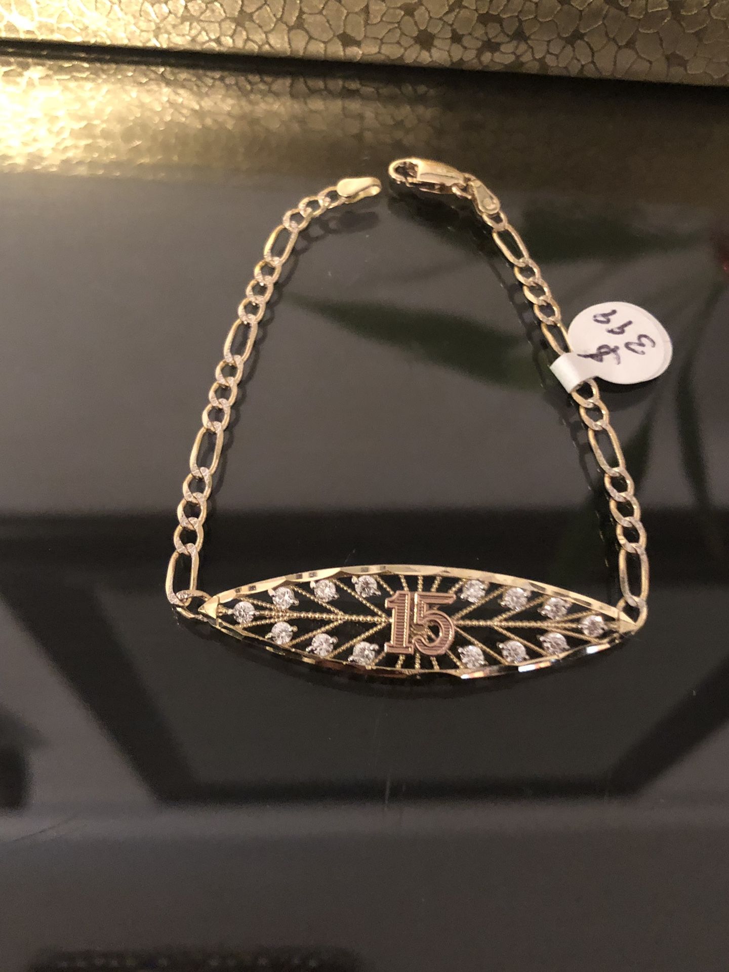 Esclava para 15 años de oro 14kt mide 7.5”