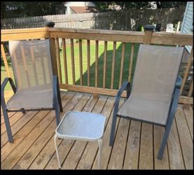 Two Outdoor Chairs and small glass table