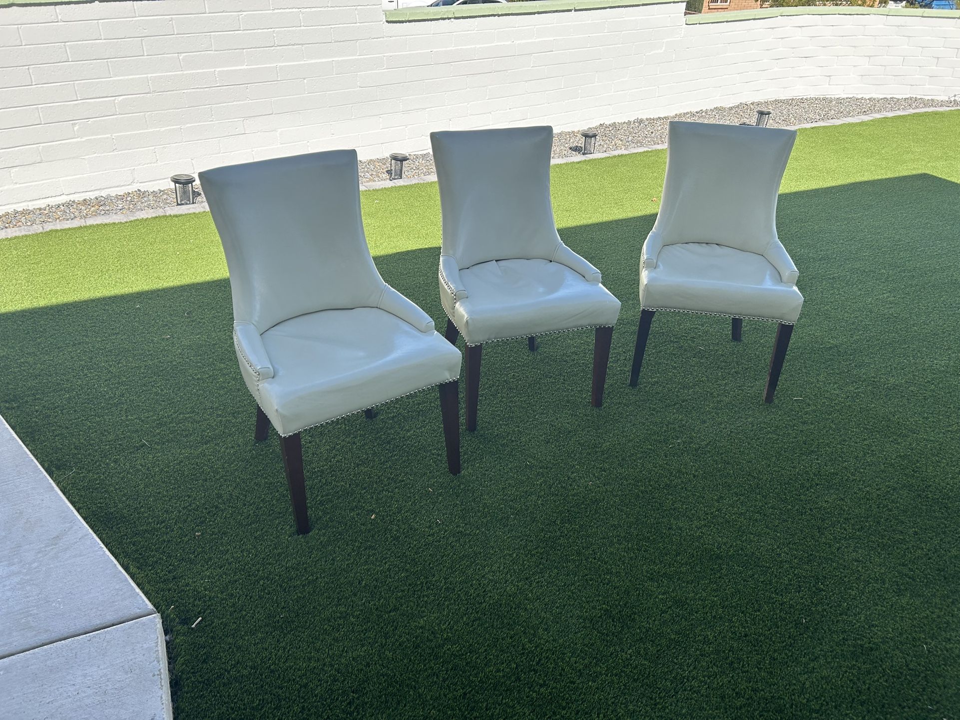 5 Safavieh Faux Leather Dining Chairs