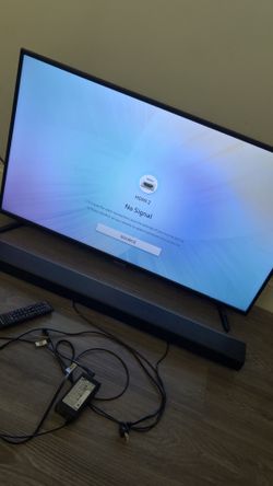 43 inch Samsung TV W/ Sound Bar
