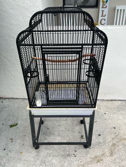 BIRD CAGE ON WHEELS  GREAT CONDITION COST ME $200 WILLING TO LET GO FOR $80