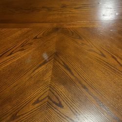 Wooden dining table with chairs