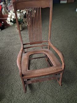 Antique rocking chair, oak, very, very old, just needs to have the seat.I believe you twine it with weather burial