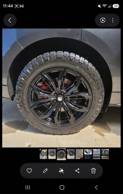 Gloss Black Alloy Wheel with All-Terrain Tire