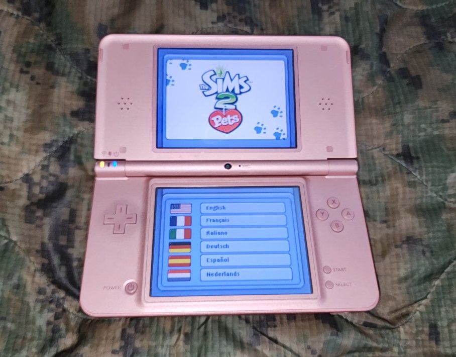 Nintendo Dsi Xl Console and 1 Game.