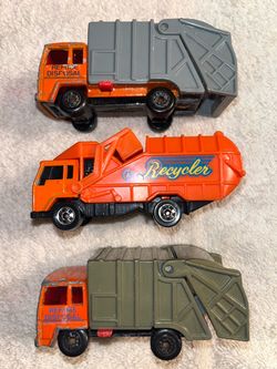 Vintage Miniature trash trucks
