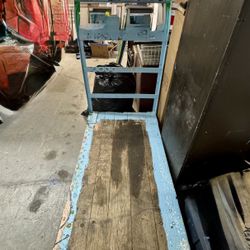 heavy-duty flat car or hand truck. 