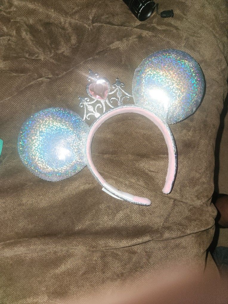 Disney Princess lridescent Ear
Headband with Tiara for Adults