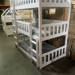 Triple bunk bed. Available in white & espresso. Assembly required. Assembly not included. Taxes included. Free delivery.  Bunk bed only-$450 Bunk bed 