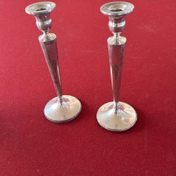 Sterling silver candlesticks with etched floral design