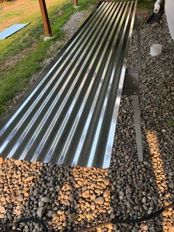 2 Corrugated metal sheets plus pieces - $50