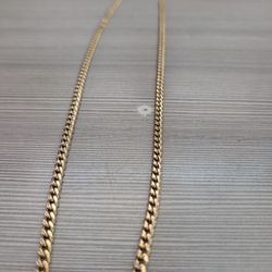 14 Kt Solid Gold Cuban link Chain. 24 Inches 