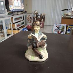 Vintage Porcelain Figurine Of An Elderly Man Sitting On A Bench Reading The Racing Form 7"H X 4.75"W