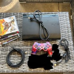 PS3 Super Slim Console 2 Controllers And Games