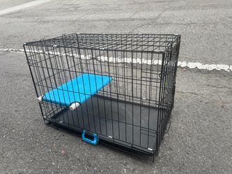 Dog crate or dog kennel.