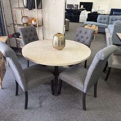 Dining table with 4 chairs in grey