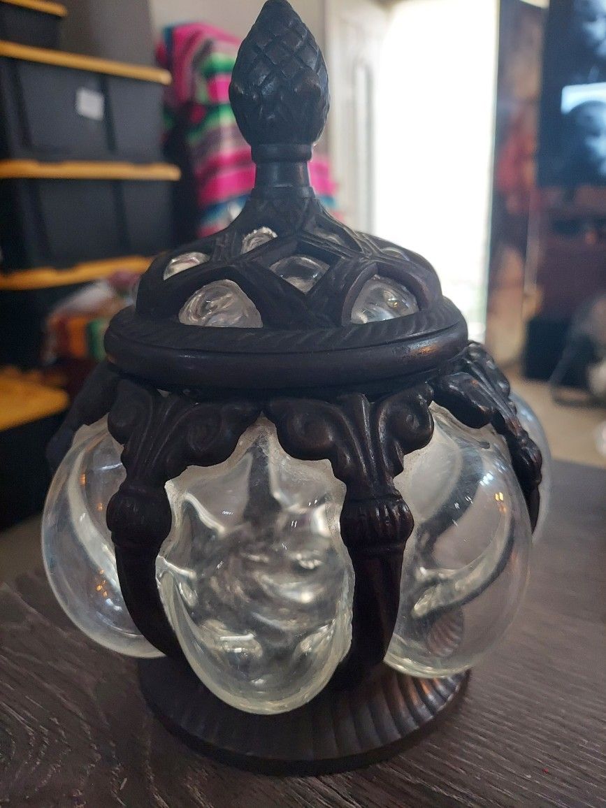 I am.
Selling this beautiful decorative piece. It has bubble glass all the way around it made with metal.