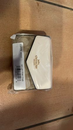 Brand new light khaki Coach purse.