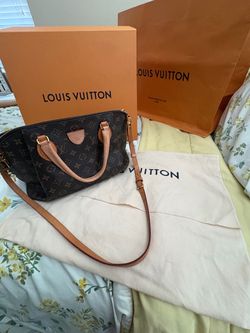 Louis Vuitton Rivoli Handbag