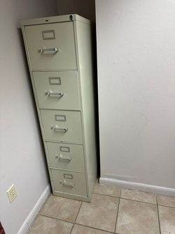 16. Five‑Drawer Metal Filing Cabinet — $50  