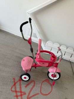 Pink tricycle