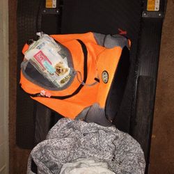 2 Doggy Carriers With Doggy Diapers 