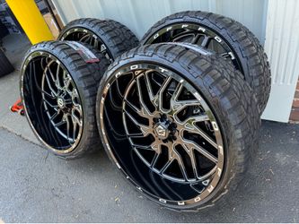 NEW 26x12 TIS wheels wrapped in RBP RT tires. 305/30r26 same as a 33.
