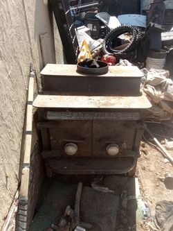 Antique wood stove must go today