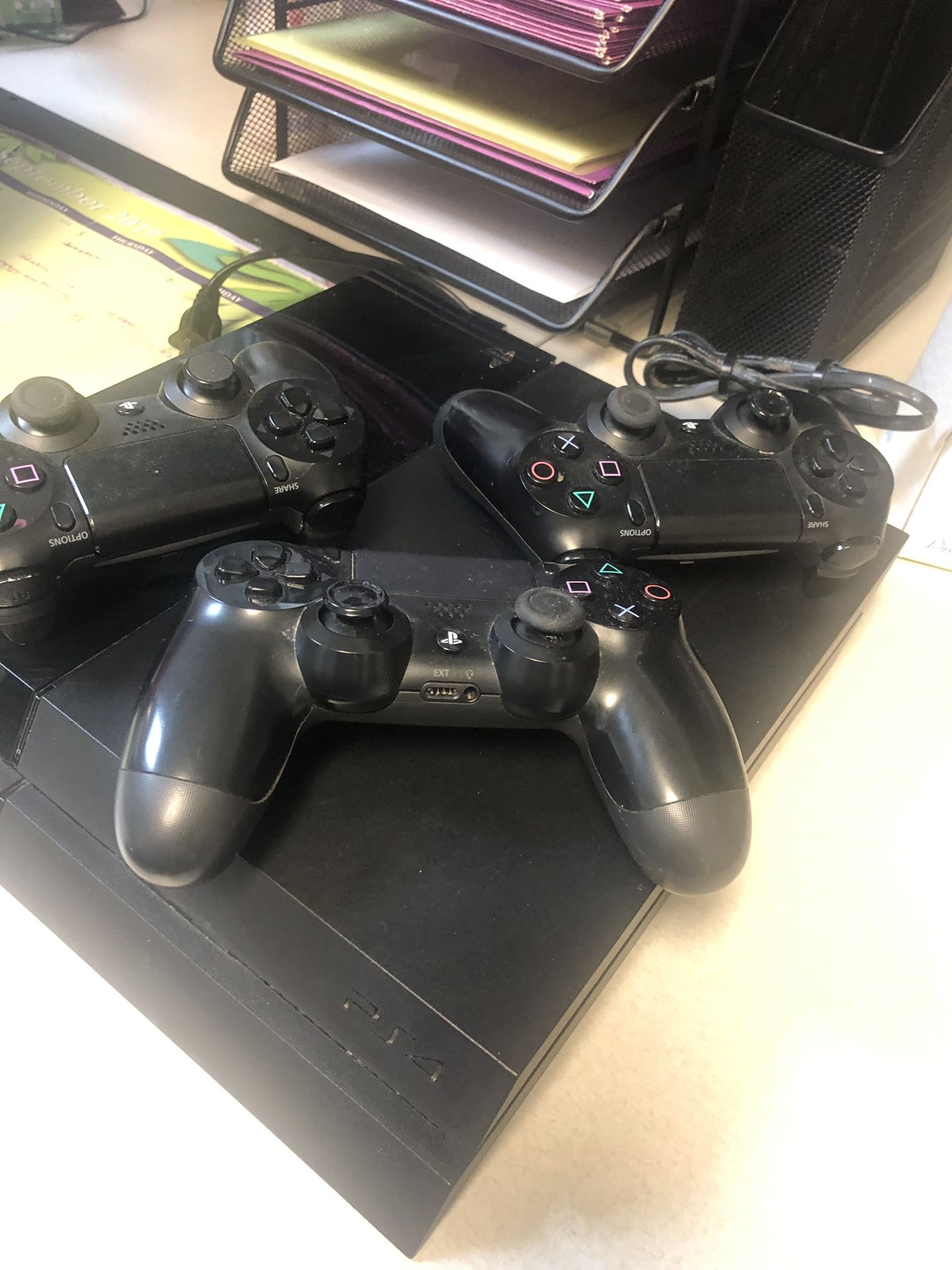 PlayStation 4 for sale with 3 controllers