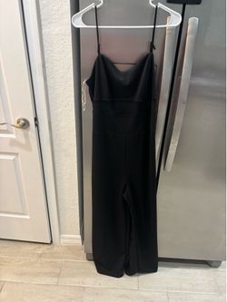 Ladies, black jumpsuit size large new with tags