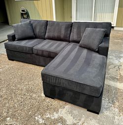 Reversible dark blue sectional couch - free delivery