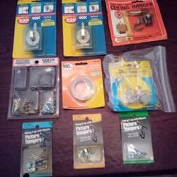 Nine Packets of Picture Hangers