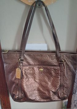 Authentic Coach Peyton shoulder bag, model number F26038, in bronze metallic embossed leather with a logo/C pattern.(Missing Shoulder Strap)