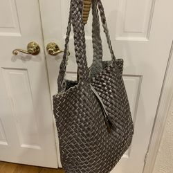 Large Beautiful Calvin Klein  Reversible Woven Gray / Metallic Silver Tote Bag With Detachable Pouch Width 16” And Height Is 13”  It is reversible, on
