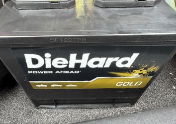 Die Hard Gold Car Battery For Sale W/ Jack Stand
